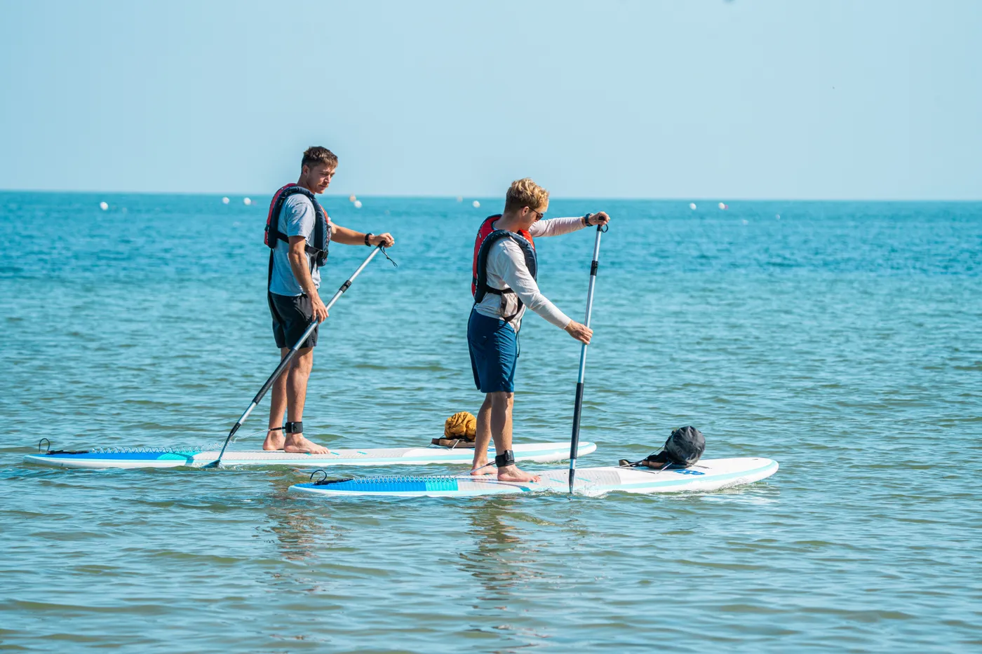 People paddleboarding