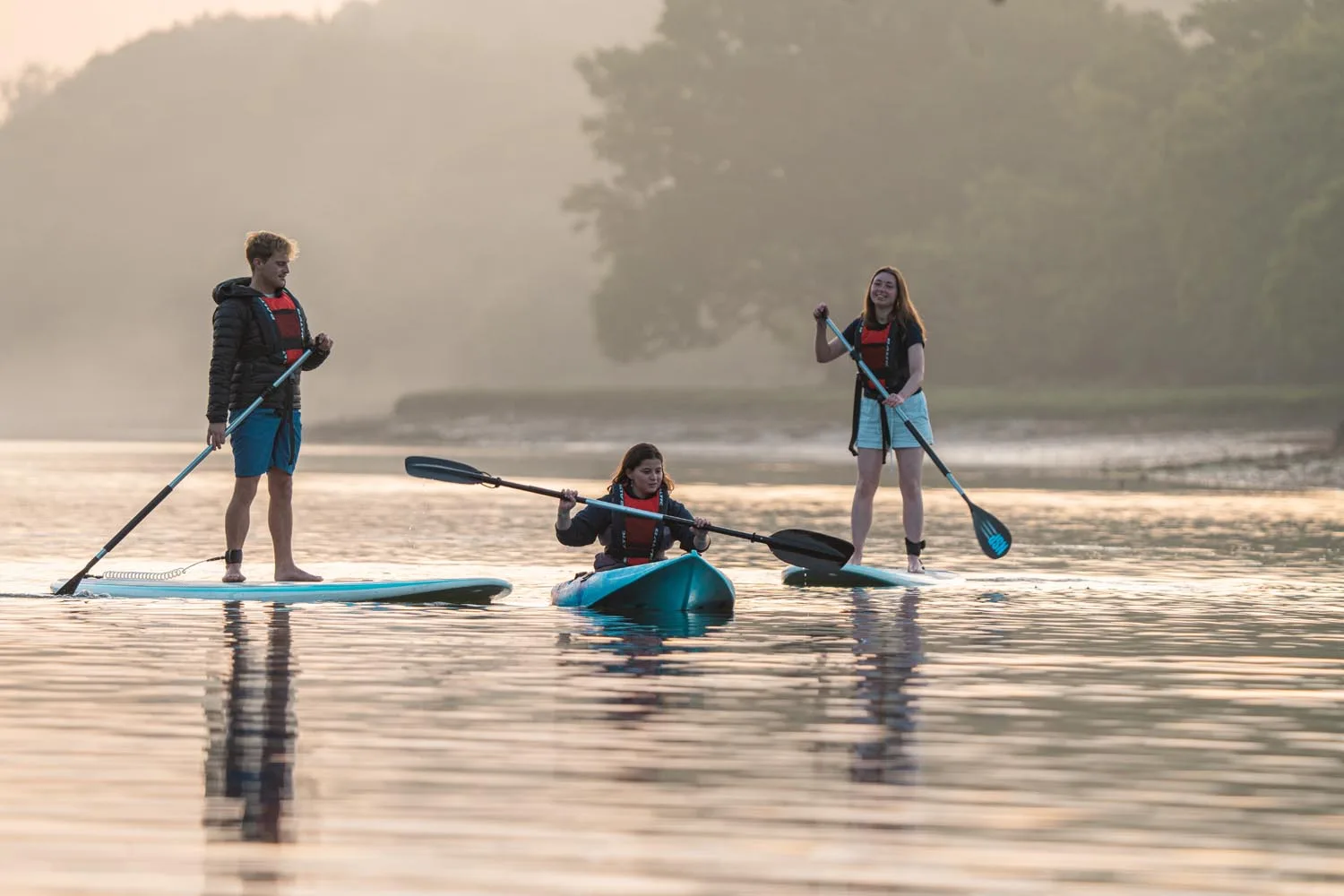Paddleboarding and kayaking on the River Hamble at sunrise