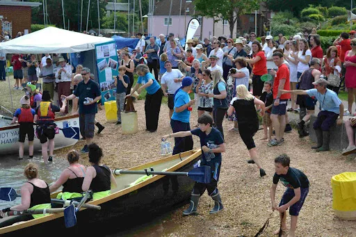 Crowds gathering at Hamble Foreshore for the Hamble River Raid paddle event