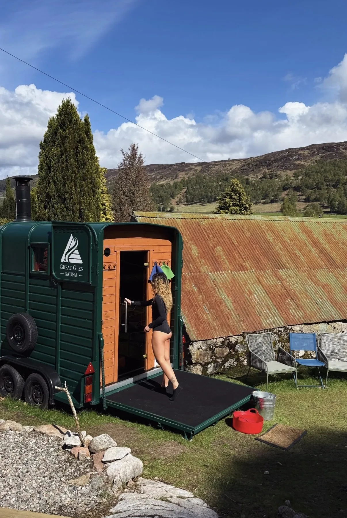The Great Glen Sauna horsebox trailer parked in the Highland countryside near Loch Oich